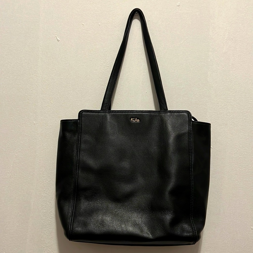 Black Tula shoulder bag in good condition. Comes with protective cover bag.